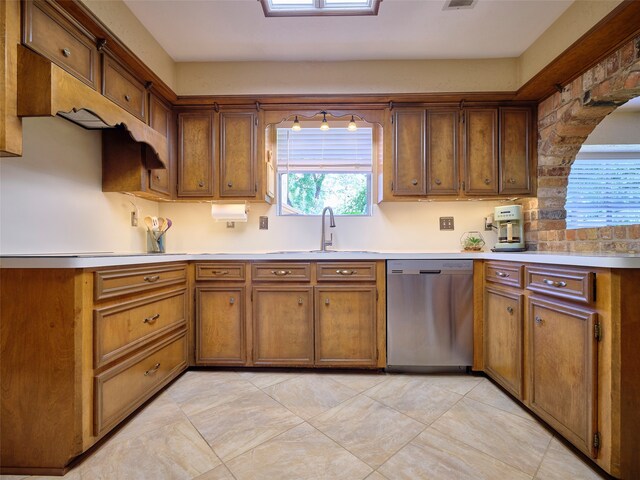 kitchen with dishwasher and sink