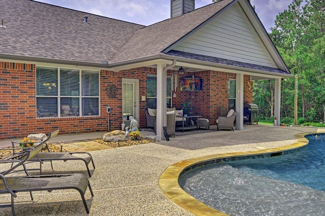 rear view of house featuring a patio