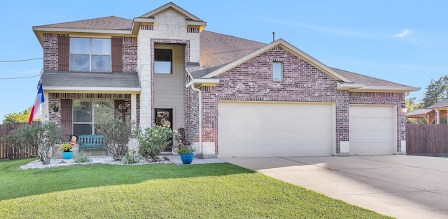 view of front of home with brick siding, a front lawn, fence, concrete driveway, and a garage