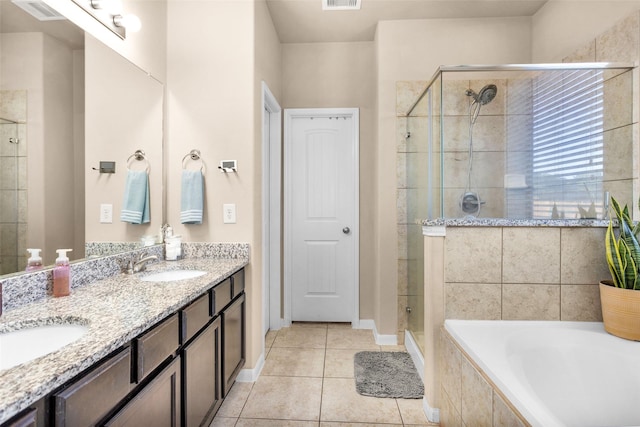 bathroom with a sink, visible vents, a bath, and a shower stall