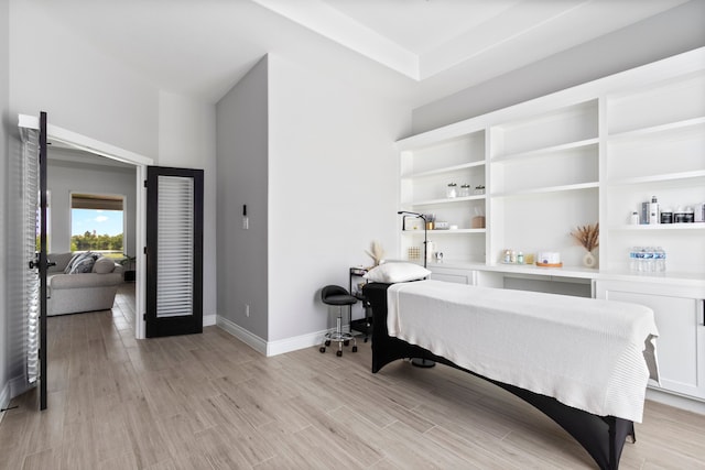 bedroom with light hardwood / wood-style flooring