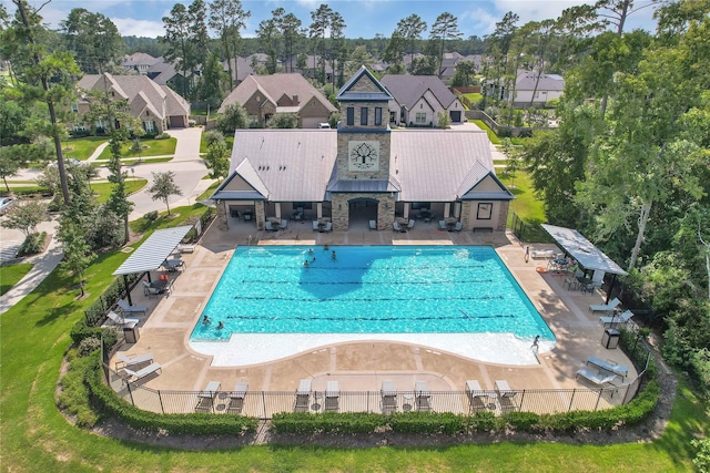 view of swimming pool with a patio area