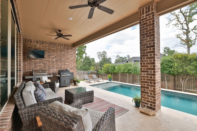 view of swimming pool featuring outdoor lounge area, a patio, and grilling area