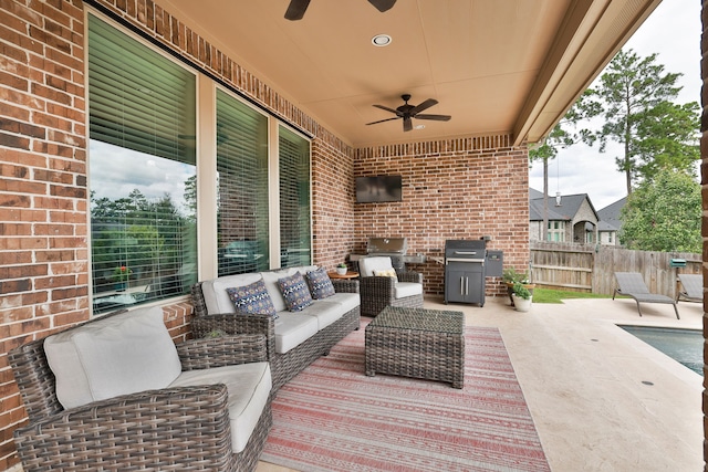 view of patio / terrace with outdoor lounge area, ceiling fan, and a grill