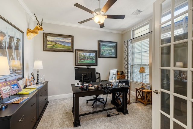 carpeted office featuring ceiling fan and crown molding