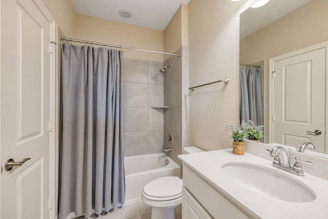 full bathroom with tile patterned floors, vanity, shower / bath combination with curtain, and toilet