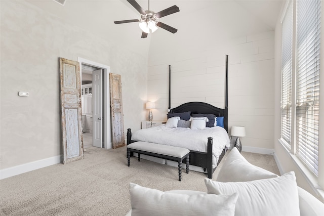 bedroom featuring ceiling fan and light colored carpet