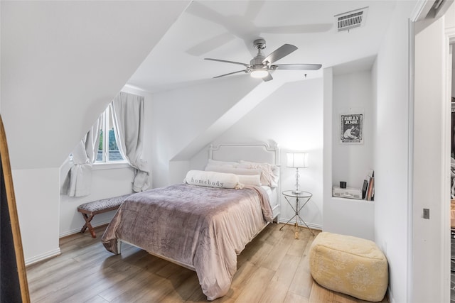 bedroom featuring light hardwood / wood-style flooring and ceiling fan