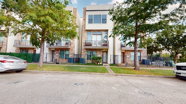 view of property featuring central air condition unit