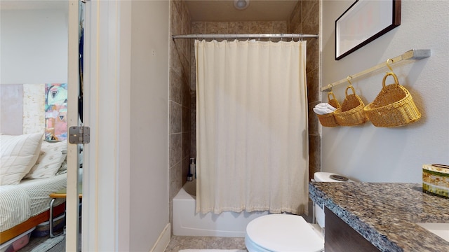 full bathroom with vanity, toilet, and shower / tub combo with curtain