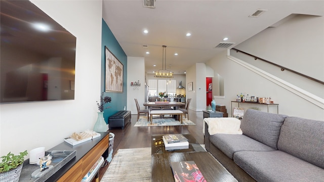 living room with dark hardwood / wood-style floors