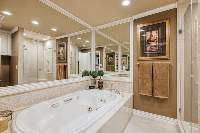 bathroom featuring ornamental molding and independent shower and bath