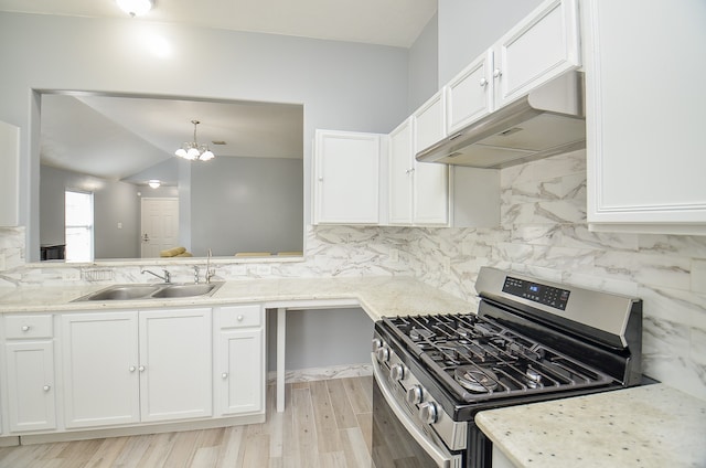 kitchen with white cabinets and stainless steel gas stove