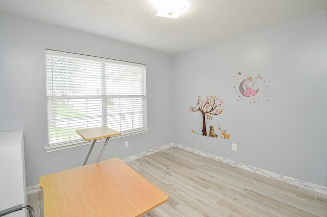 office area with light wood-type flooring