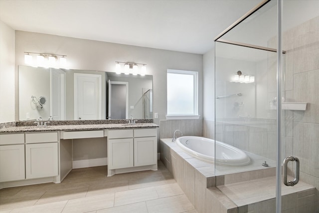 bathroom with shower with separate bathtub, tile patterned floors, and vanity