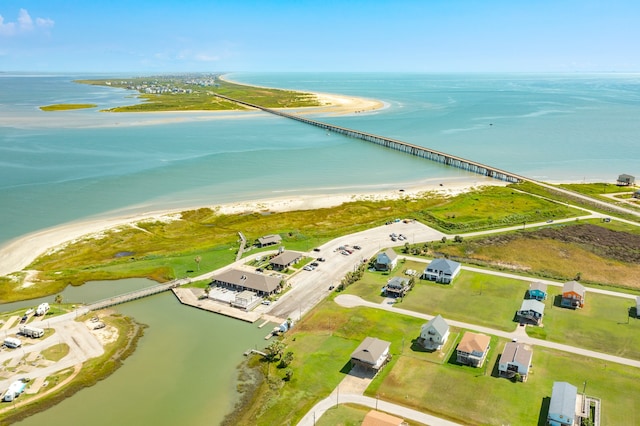 bird's eye view with a view of the beach and a water view