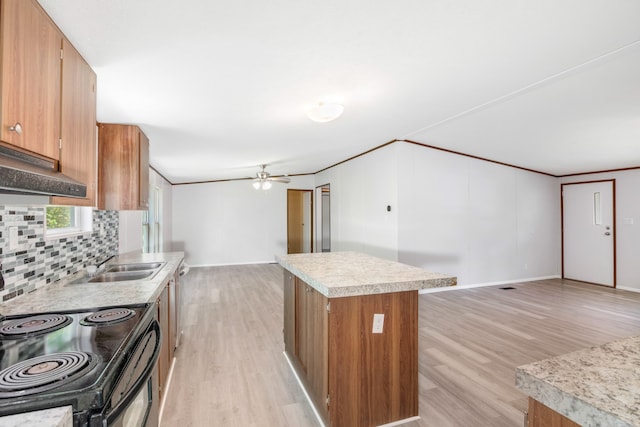 kitchen featuring ceiling fan, light wood-type flooring, black electric range oven, and decorative backsplash