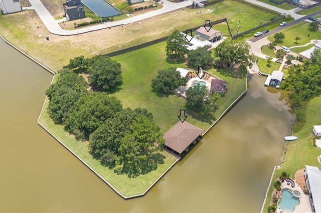 birds eye view of property featuring a water view