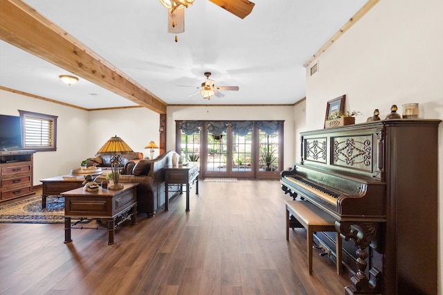 living room with crown molding, ceiling fan, and hardwood / wood-style flooring