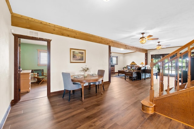 dining space with ceiling fan and dark hardwood / wood-style floors