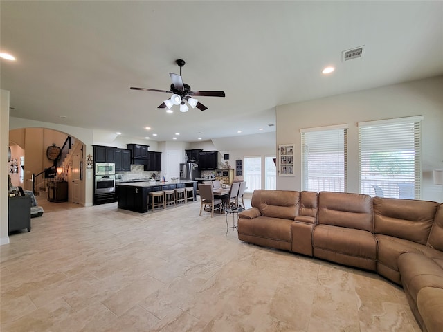 living room featuring ceiling fan