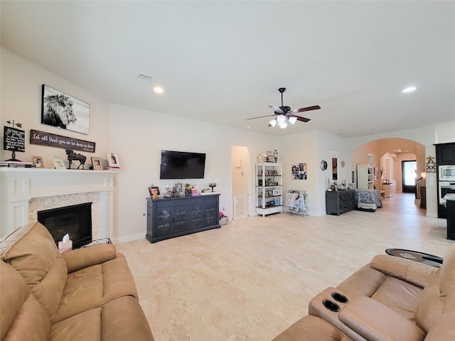 living room featuring ceiling fan