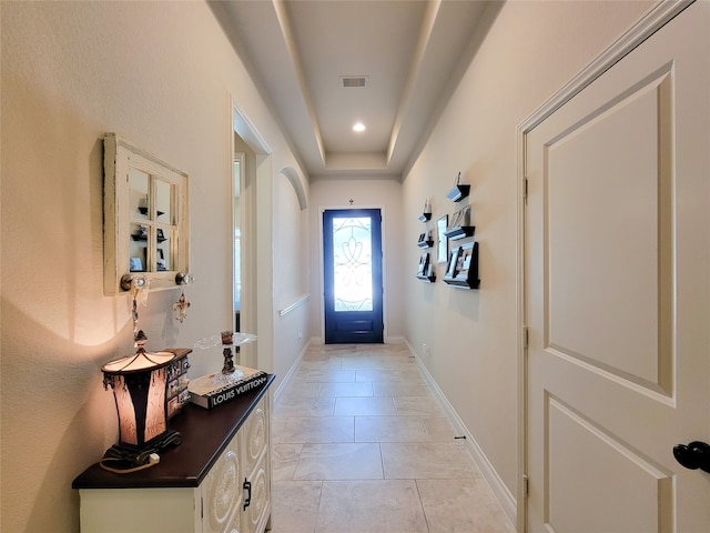 doorway featuring light tile patterned floors