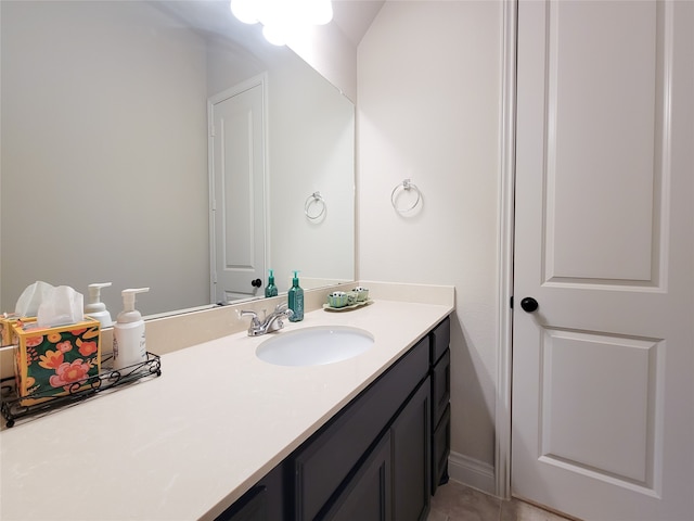 bathroom with vanity and tile patterned floors