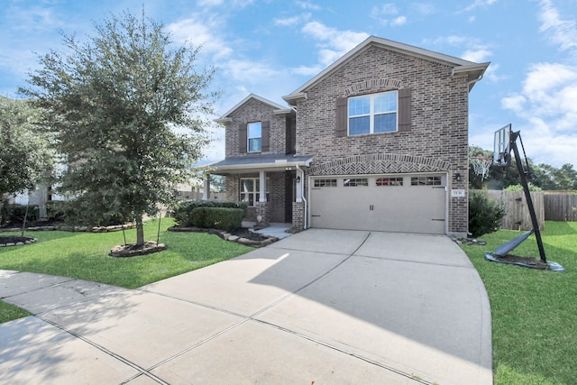 view of front of home featuring a front yard and a garage