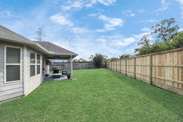 view of yard with a patio area