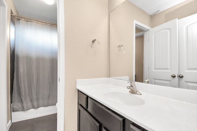 bathroom with vanity and tile patterned floors