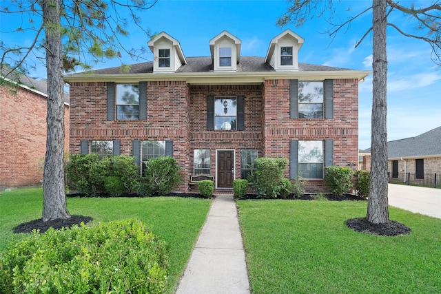 view of front of home with a front yard