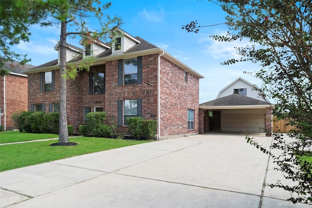 view of front facade with a front yard, a garage, and a carport