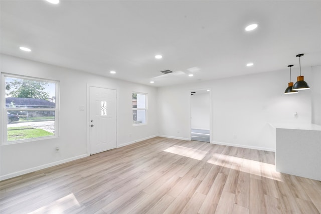 entrance foyer with light wood-type flooring