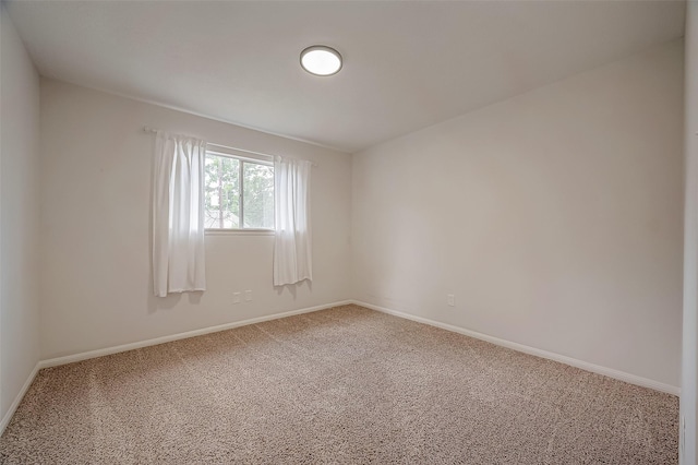 empty room featuring carpet floors