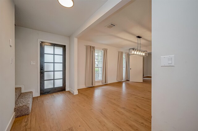 foyer with light wood-type flooring