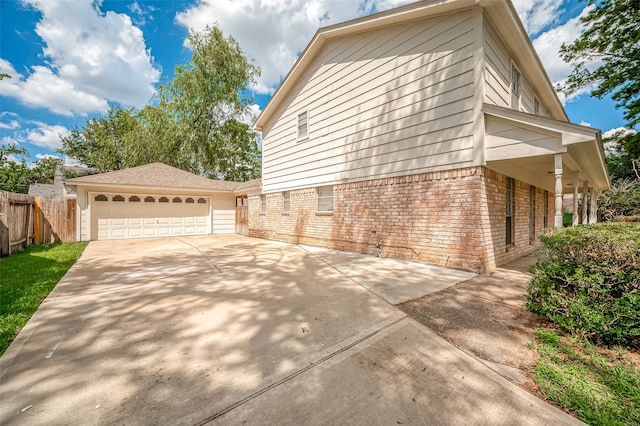 view of home's exterior with a garage