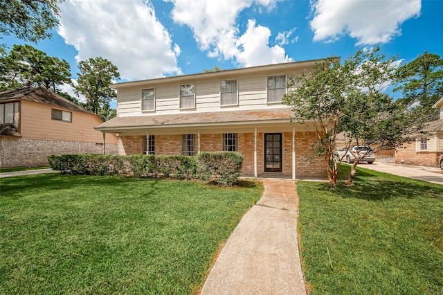 view of front of home with a front yard