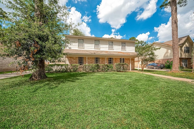 view of front of property with a front lawn