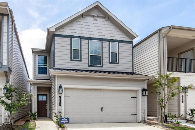 view of front of property with a garage