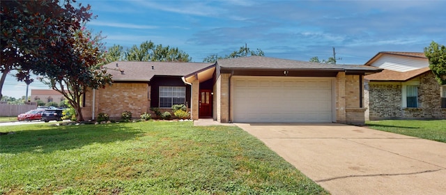 ranch-style house with a front yard and a garage