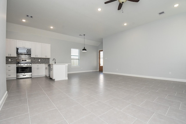 unfurnished living room with light tile patterned floors, recessed lighting, ceiling fan, and baseboards
