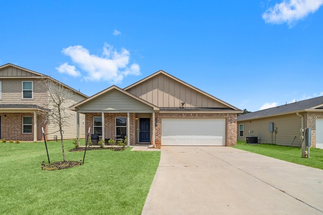 craftsman-style house with a front yard, cooling unit, and a garage