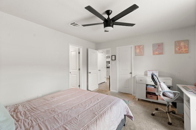 carpeted bedroom with ceiling fan