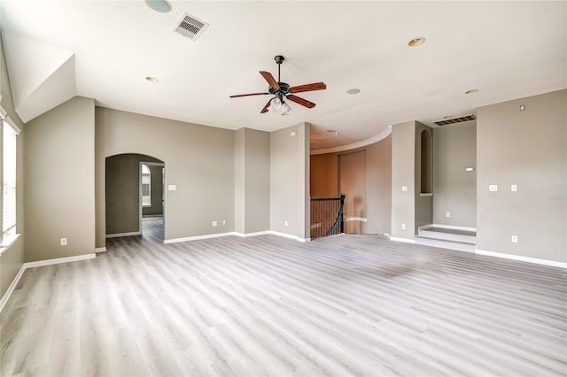 unfurnished living room with light hardwood / wood-style flooring and ceiling fan