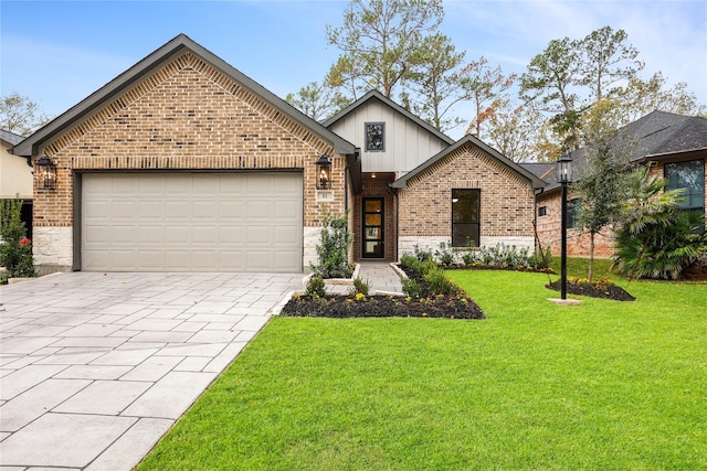 view of front facade featuring a garage and a front lawn