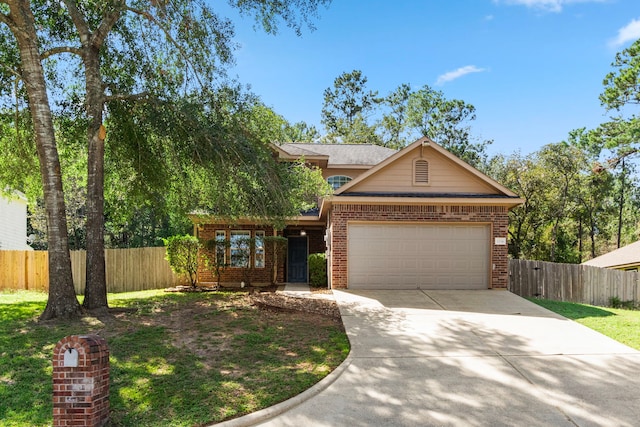 view of front of property featuring a garage and a front lawn