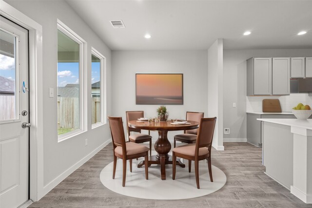 dining room featuring light hardwood / wood-style floors