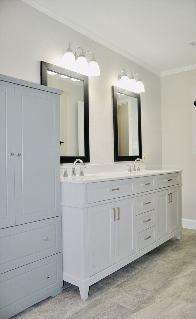 bathroom with vanity and crown molding