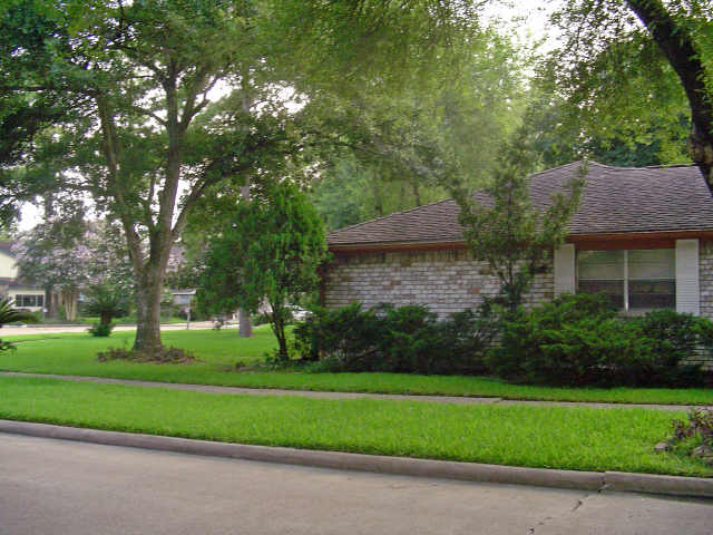 view of home's exterior featuring a lawn